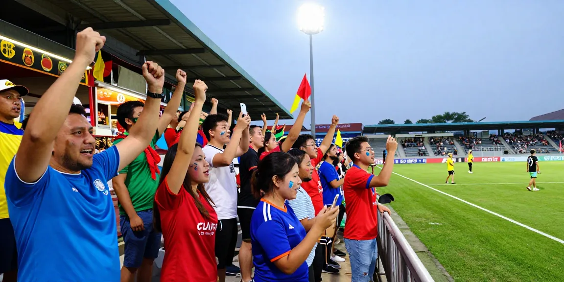 Cheering fans at a football match, شاهد المباريات هنا. Excitement in vibrant stadium atmosphere.